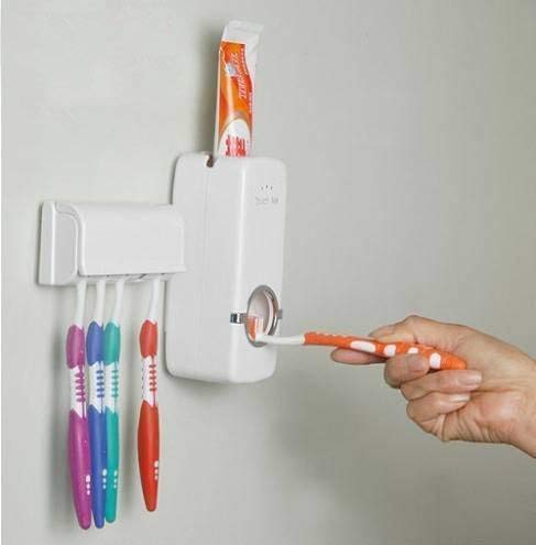 Tooth brush stand with paste dispenser