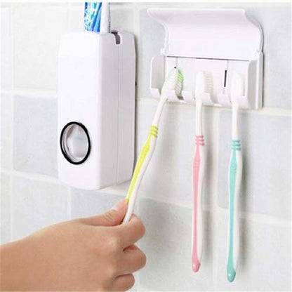 Tooth brush stand with paste dispenser